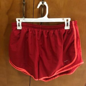 Red Nike dri fit running shorts